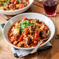 Hearty lamb stew with tomatoes and barley